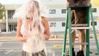 Blonde milf Phoenix Marie gets soaked in wet tshirt for charity